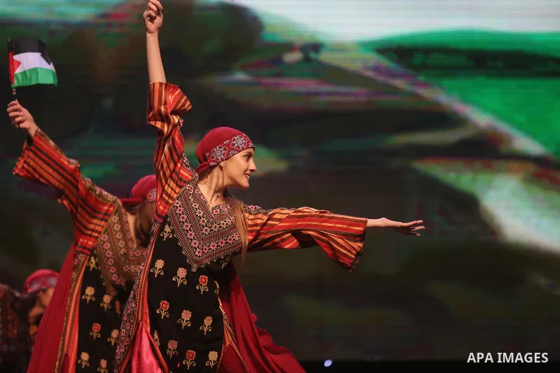 Palestinian Asayel band of folk art, perform during a show on the stage in the West Bank city of Ramallah, on June 26, 2018. Photo by Shadi Hatem