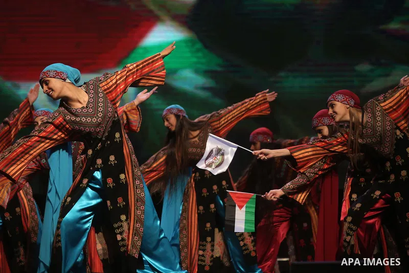 Palestinian Asayel band of folk art, perform during a show on the stage in the West Bank city of Ramallah, on June 26, 2018. Photo by Shadi Hatem