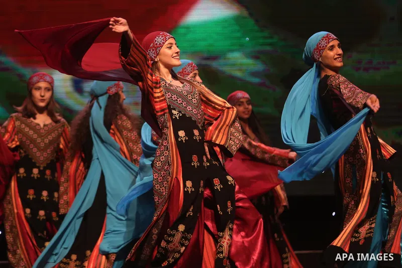 Palestinian Asayel band of folk art, perform during a show on the stage in the West Bank city of Ramallah, on June 26, 2018. Photo by Shadi Hatem