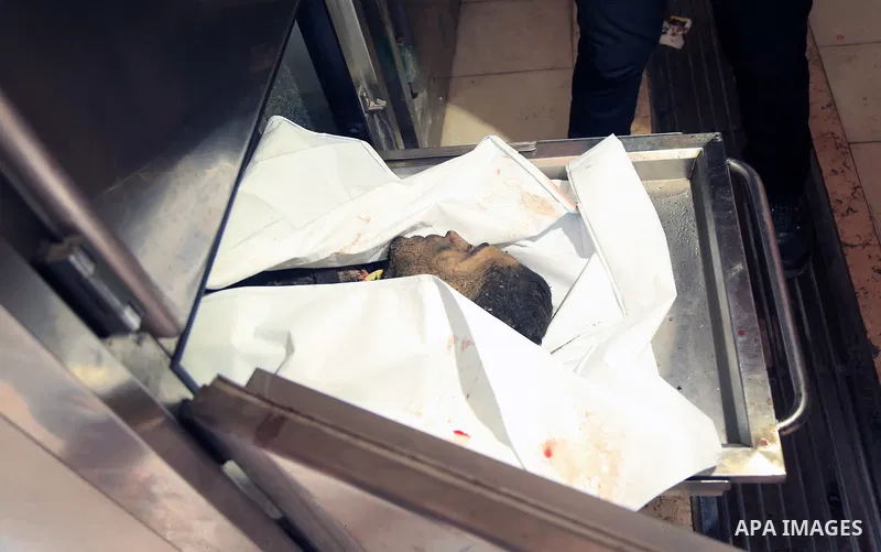 The body of Palestinian, who was killed in an unexplained explosion is seen at Indonesian hospital, in the northern of Gaza Strip on July 29, 2018. Photo by Dawoud Abo Alkas