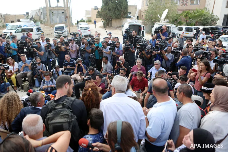 Palestinian activist and campaigner Ahed Tamimi and her mother hold a press conference in the West Bank village of Nabi Saleh near Ramallah on July 29, 2018, upon her release from prison after an eight-month sentence for...