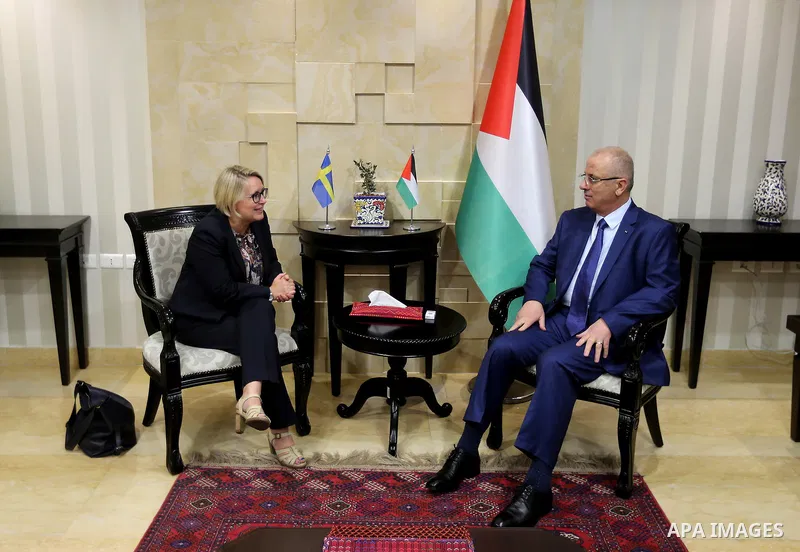 Palestinian Prime Minister Rami Hamdallah meets with Consul General of Sweden Ann Sophie Nelson in the West Bank city of Ramallah on July 30, 2018. Photo by Prime Minister Office