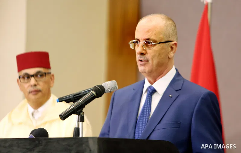 Palestinian Prime Minister Rami Hamdallah speaks during the ceremony of Moroccan National Day, in the West Bank city of Ramallah on July 30, 2018. Photo by Prime Minister Office