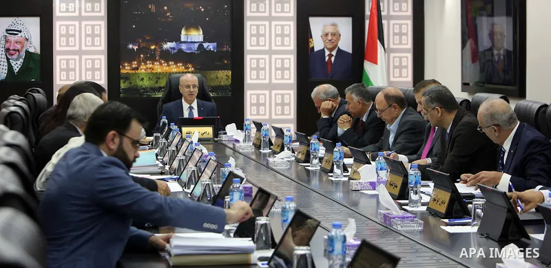 Palestinian Prime Minister Rami Hamdallah chairs a meeting with council of Ministers in the West Bank city of Ramallah on July 31, 2018. Photo by Prime Minister Office