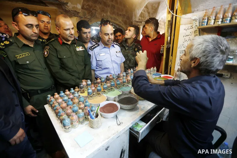 Head of the Palestinian National security forces in Hebron brigadier General Hazem Abu Hanood and head of the Palestinian police brigadier General Ahmad Abu Rob in Hebron visit the old city for the first time since 1994,...