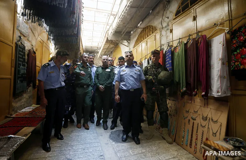 Head of the Palestinian National security forces in Hebron brigadier General Hazem Abu Hanood and head of the Palestinian police brigadier General Ahmad Abu Rob in Hebron visit the old city for the first time since 1994,...