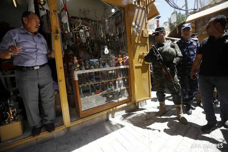 Head of the Palestinian National security forces in Hebron brigadier General Hazem Abu Hanood and head of the Palestinian police brigadier General Ahmad Abu Rob in Hebron visit the old city for the first time since 1994,...
