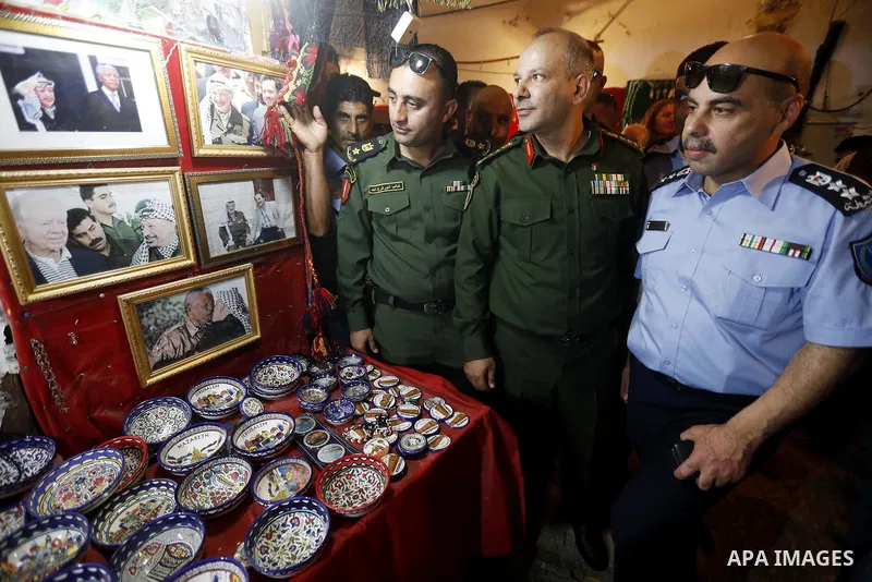 Head of the Palestinian National security forces in Hebron brigadier General Hazem Abu Hanood and head of the Palestinian police brigadier General Ahmad Abu Rob in Hebron visit the old city for the first time since 1994,...