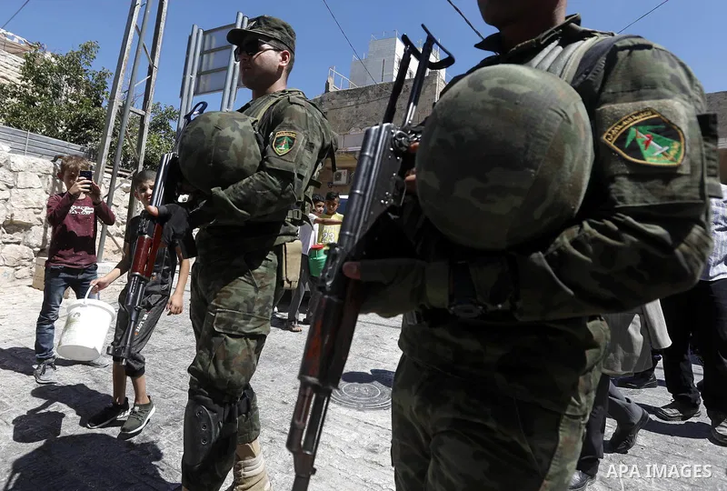 Head of the Palestinian National security forces in Hebron brigadier General Hazem Abu Hanood and head of the Palestinian police brigadier General Ahmad Abu Rob in Hebron visit the old city for the first time since 1994,...