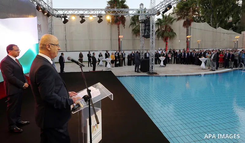 Palestinian Prime Minister Rami Hamdallah attends the ceremony of Egyptian national day, the anniversary of the July revolution in the West Bank city of Ramallah on July 31, 2018. Photo by Prime Minister Office