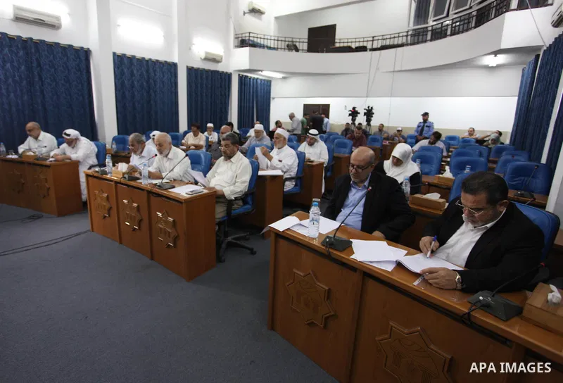 Members of the Palestinian legislative council from Hamas movement attend a meeting at the legislative council, in Gaza city, on Aug. 01, 2018. Photo by Mahmoud Ajour