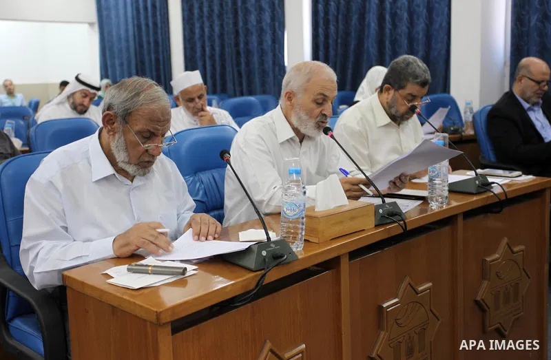 Members of the Palestinian legislative council from Hamas movement attend a meeting at the legislative council, in Gaza city, on Aug. 01, 2018. Photo by Mahmoud Ajour