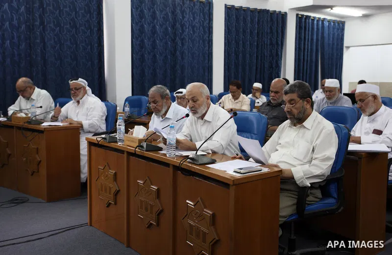Members of the Palestinian legislative council from Hamas movement attend a meeting at the legislative council, in Gaza city, on Aug. 01, 2018. Photo by Mahmoud Ajour