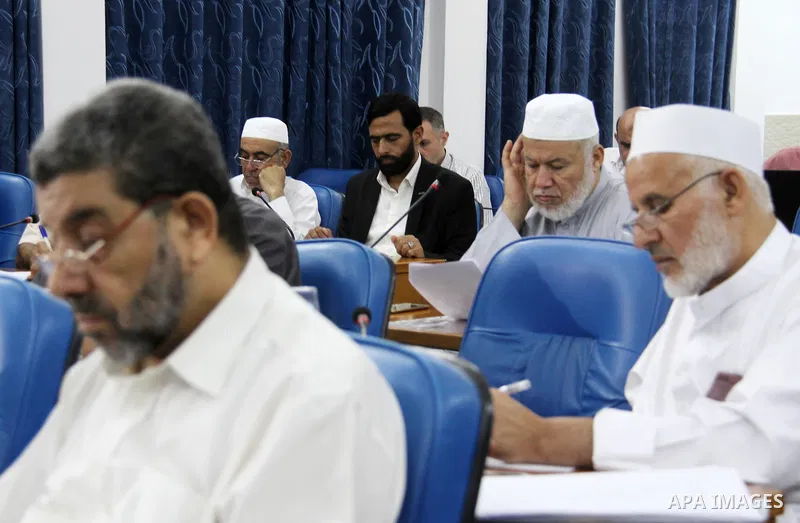 Members of the Palestinian legislative council from Hamas movement attend a meeting at the legislative council, in Gaza city, on Aug. 01, 2018. Photo by Mahmoud Ajour