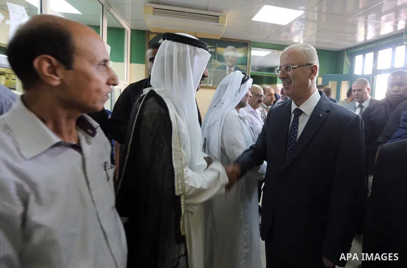 Palestinian Prime Minister Rami Hamdallah opens departments in Hebron hospitals, in the West Bank city of Hebron, on Aug. 01, 2018. Photo by Prime Minister Office