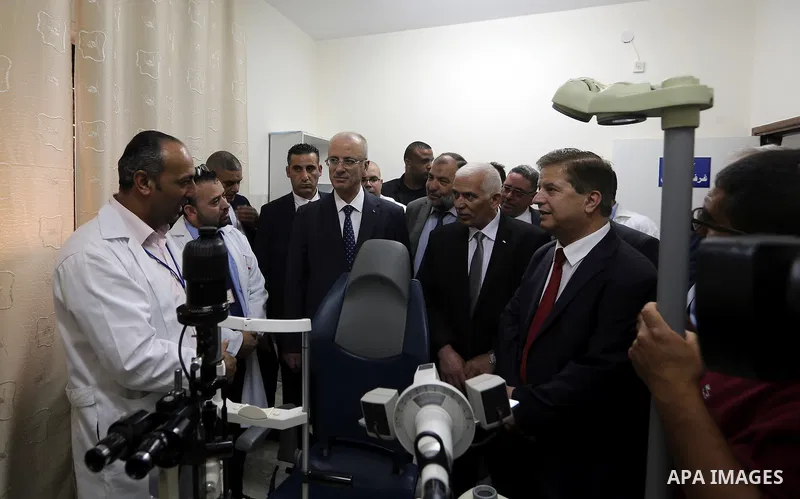 Palestinian Prime Minister Rami Hamdallah opens departments in Hebron hospitals, in the West Bank city of Hebron, on Aug. 01, 2018. Photo by Prime Minister Office