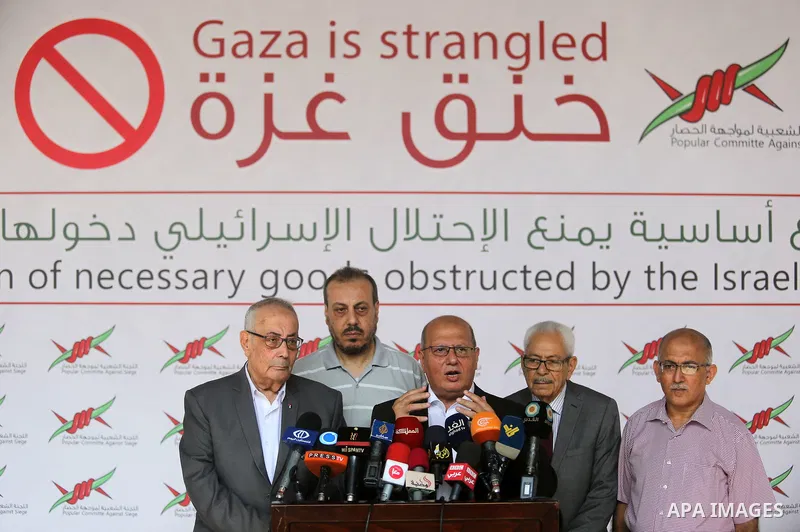 Head of the Popular Committee Jamal El-Khodari speaks during a press conference, in Gaza city on Aug. 02, 2018. Photo by Ashraf Amra