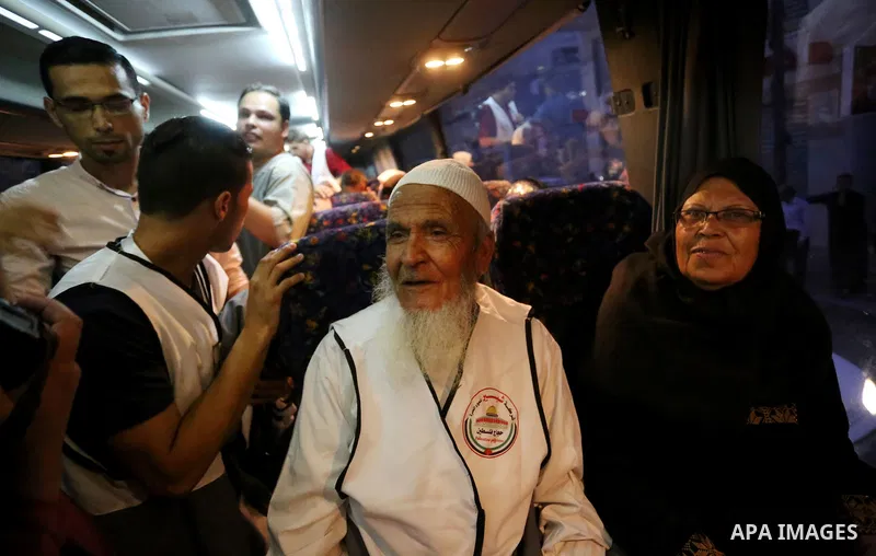 Palestinians bid farewell to their relatives who is preparing to leaves Gaza for the annual Hajj pilgrimage in Mecca, in Khan Younis the southern Gaza Strip August 3, 2018. Photo by Ashraf Amra