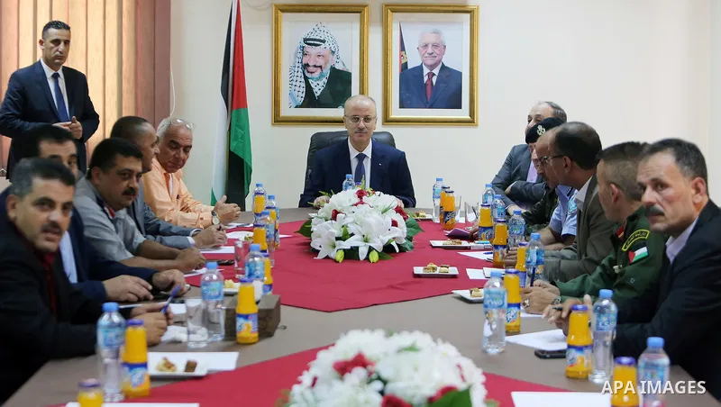Palestinian Prime Minister Rami Hamdallah chairs a meeting with security chiefs, in the West Bank city of Jenin on Aug. 04, 2018. Photo by Prime Minister Office
