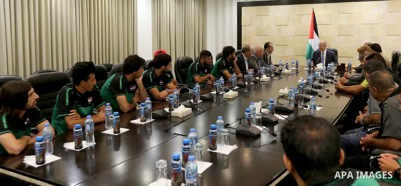 Palestinian Prime Minister Rami Hamdallah, meets with the Iraqi team for football in the West Bank city of Ramallah on August 5, 2018. Photo by Prime Minister Office