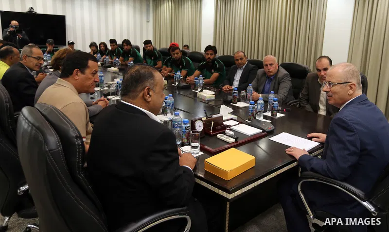 Palestinian Prime Minister Rami Hamdallah, meets with the Iraqi team for football in the West Bank city of Ramallah on August 5, 2018. Photo by Prime Minister Office