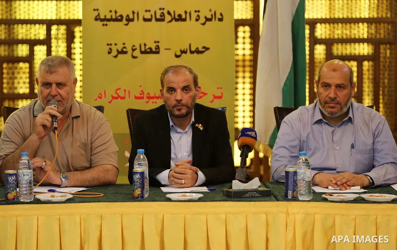 Palestinian Hamas official Husam Badran attends a meeting with Palestinian factions in Gaza City on August 5, 2018. Photo by Ashraf Amra
