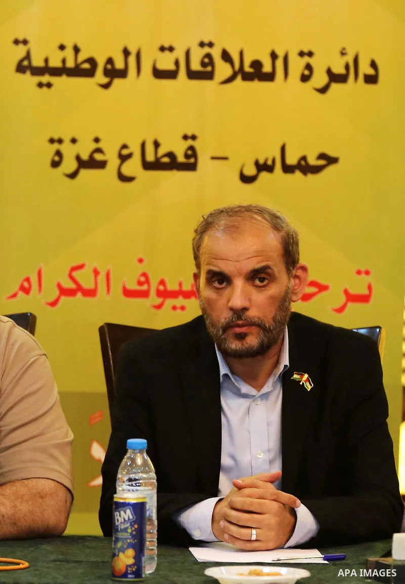 Palestinian Hamas official Husam Badran attends a meeting with Palestinian factions in Gaza City on August 5, 2018. Photo by Ashraf Amra