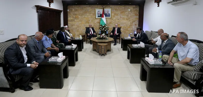 Palestinian Prime Minister Rami Hamdallah, attends the opening of the city of pilgrims at the King Hussein crossing, in the West Bank city of Jericho on August 6, 2018. Photo by Prime Minister Office