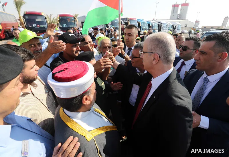 Palestinian Prime Minister Rami Hamdallah, attends the opening of the city of pilgrims at the King Hussein crossing, in the West Bank city of Jericho on August 6, 2018. Photo by Prime Minister Office