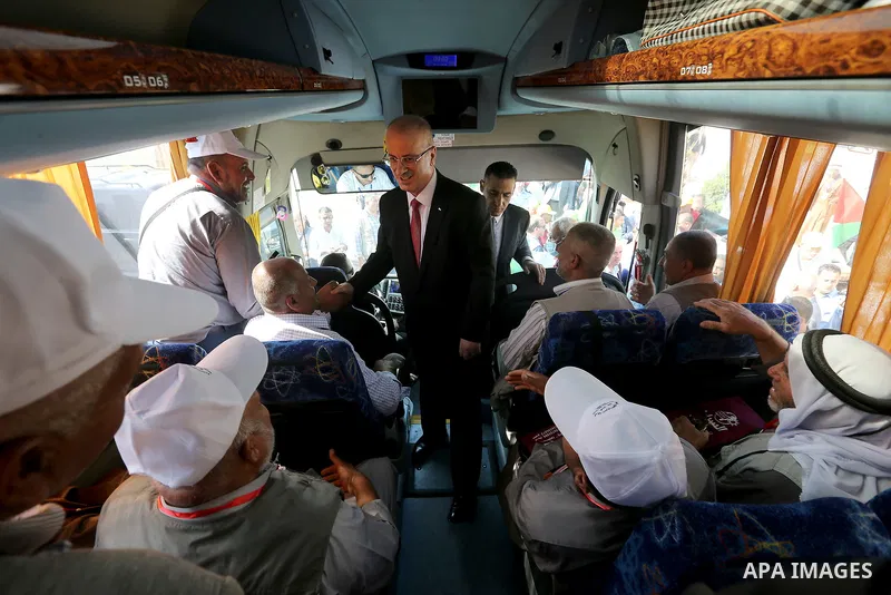 Palestinian Prime Minister Rami Hamdallah, attends the opening of the city of pilgrims at the King Hussein crossing, in the West Bank city of Jericho on August 6, 2018. Photo by Prime Minister Office