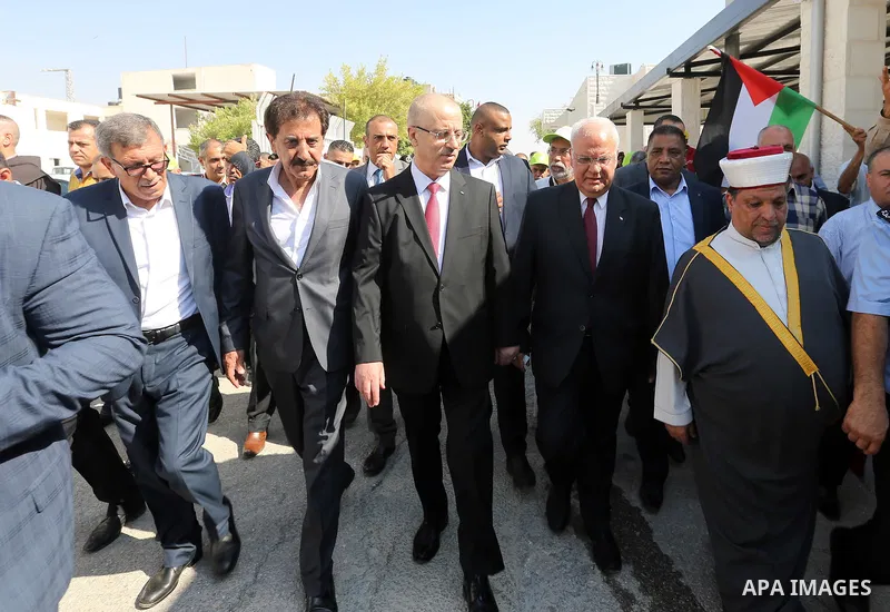 Palestinian Prime Minister Rami Hamdallah, attends the opening of the city of pilgrims at the King Hussein crossing, in the West Bank city of Jericho on August 6, 2018. Photo by Prime Minister Office