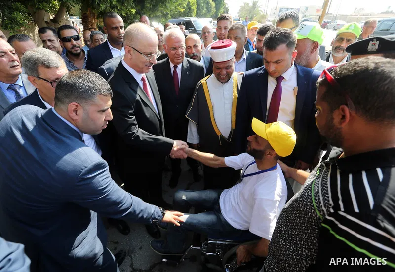 Palestinian Prime Minister Rami Hamdallah, attends the opening of the city of pilgrims at the King Hussein crossing, in the West Bank city of Jericho on August 6, 2018. Photo by Prime Minister Office