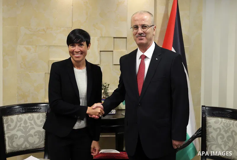 Palestinian Prime Minister Rami Hamdallah, meets with Norway's Foreign Minister, Anne-Marie Eriksen, in the West Bank city of Ramallah on August 6, 2018. Photo by Prime Minister Office
