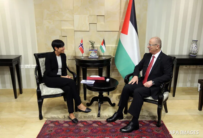 Palestinian Prime Minister Rami Hamdallah, meets with Norway's Foreign Minister, Anne-Marie Eriksen, in the West Bank city of Ramallah on August 6, 2018. Photo by Prime Minister Office