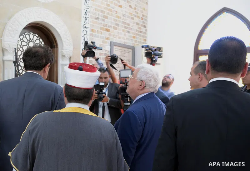 Palestinian President Mahmoud Abbas inspects City of pilgrims, in the West Bank of Jericho, on Aug. 06, 2018. Photo by Thaer Ganaim
