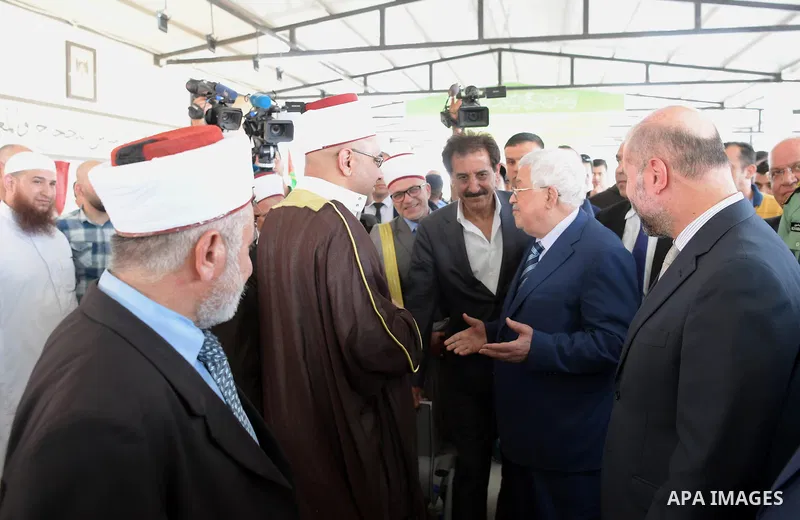 Palestinian President Mahmoud Abbas inspects City of pilgrims, in the West Bank of Jericho, on Aug. 06, 2018. Photo by Thaer Ganaim