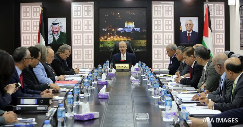 Palestinian Prime Minister Rami Hamdallah chairs a meeting with council of Ministers in the West Bank city of Ramallah on August 7, 2018. Photo by Prime Minister Office