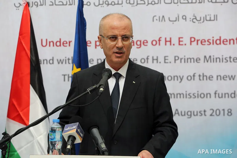 Palestinian Prime Minister Rami Hamdallah attends the opening of the headquarters of the Central Election Commission, in the West Bank city of Ramallah on August 9, 2018. Photo by Prime Minister Office
