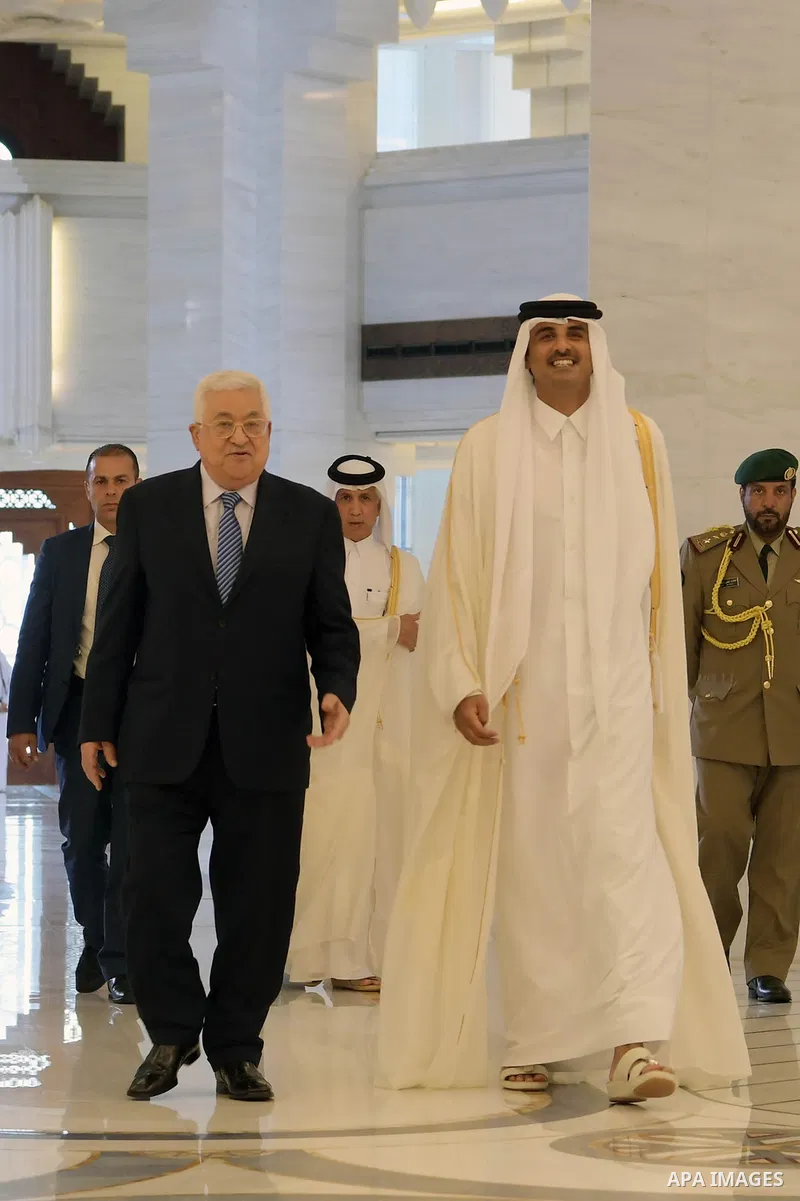 Palestinian President Mahmoud Abbas meets with Qatar Emir Sheikh Tamim bin Hamad al-Thani, in Doha, Qatar on August 9, 2018. Photo by Thaer Ganaim