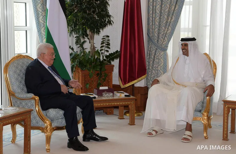 Palestinian President Mahmoud Abbas meets with Qatar Emir Sheikh Tamim bin Hamad al-Thani, in Doha, Qatar on August 9, 2018. Photo by Thaer Ganaim