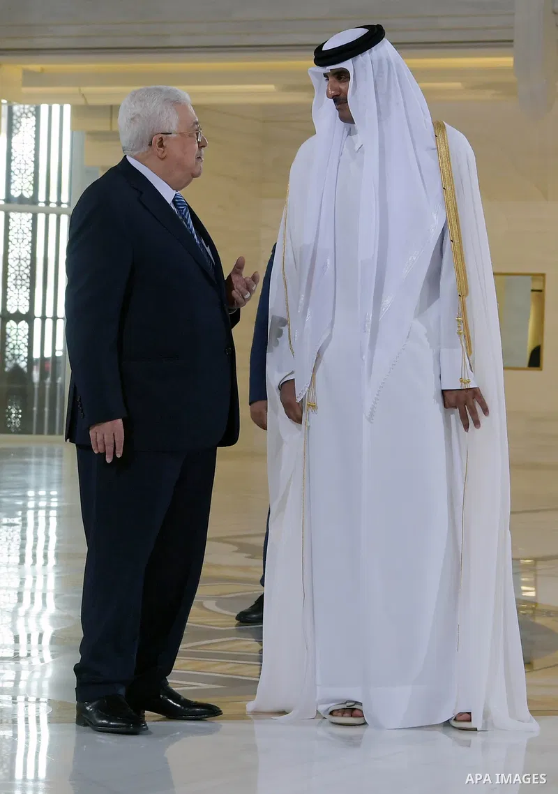 Palestinian President Mahmoud Abbas meets with Qatar Emir Sheikh Tamim bin Hamad al-Thani, in Doha, Qatar on August 9, 2018. Photo by Thaer Ganaim