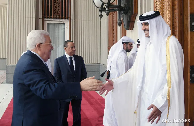 Palestinian President Mahmoud Abbas meets with Qatar Emir Sheikh Tamim bin Hamad al-Thani, in Doha, Qatar on August 9, 2018. Photo by Thaer Ganaim