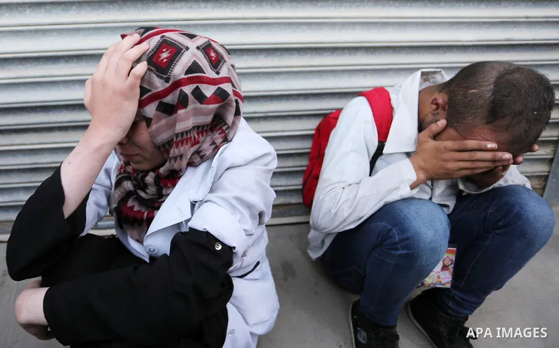 Colleagues of Palestinian medic Abdullah Al-Kotati, who was killed by Israeli troops while trying to help wounded protesters during clashes where Palestinians demand the right to return to their homeland at the Israel-Ga...