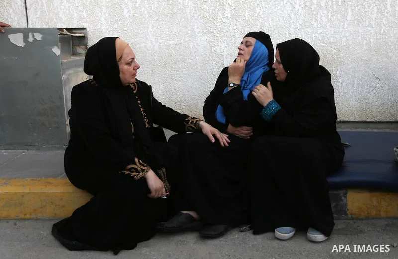 Relatives of Palestinian medic Abdullah Al-Kotati, who was killed by Israeli troops while trying to help wounded protesters during clashes where Palestinians demand the right to return to their homeland at the Israel-Gaz...
