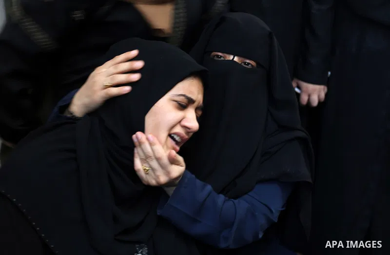 Relatives of Palestinian volunteer medic Abdullah Al-Kotati, who was killed the day before by Israeli troops while trying to help wounded protesters during clashes where Palestinians demand the right to return to their h...