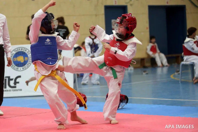 Palestinian children compete during taekwondo championship, in the West Bank city of Ramallah on August 11, 2018. Photo by Shadi Hatem