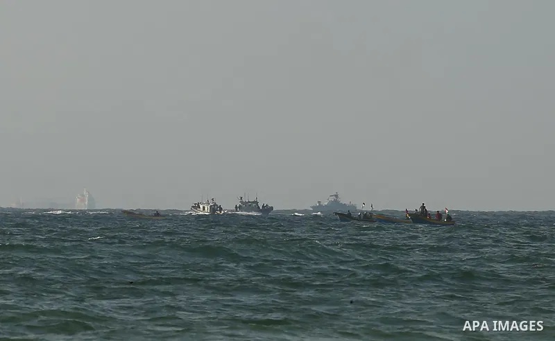 Palestinians ride fishing boats during a rally to break Israel's blockade on Gaza Strip, at the sea in Gaza City, on August 11, 2018. Photo by Dawoud Abo Alkas