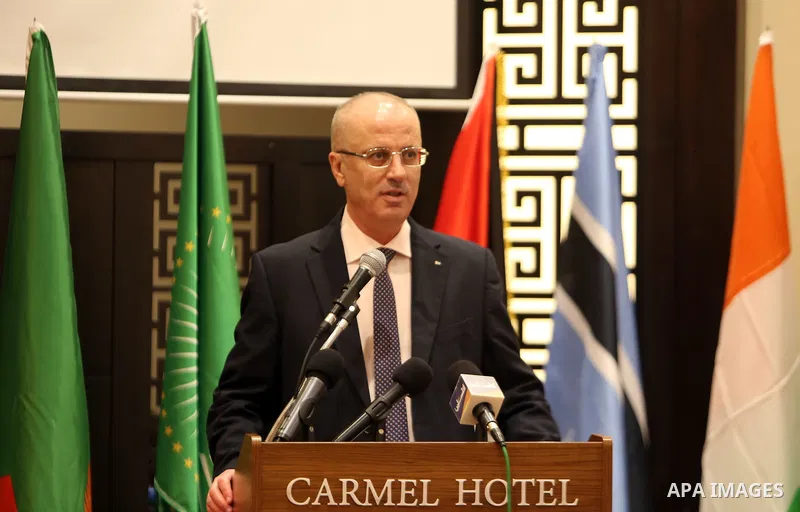 Palestinian Prime Minister, Rami Hamdallah, attends the opening of the "African training program" at the National School of Administration, in the West Bank city of Ramallah, on August 12, 2018. Photo by Prime Minister O...