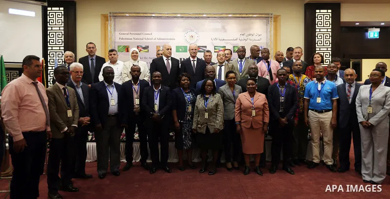 Palestinian Prime Minister, Rami Hamdallah, attends the opening of the "African training program" at the National School of Administration, in the West Bank city of Ramallah, on August 12, 2018. Photo by Prime Minister O...