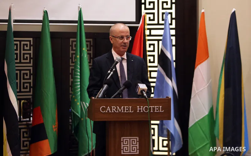 Palestinian Prime Minister, Rami Hamdallah, attends the opening of the "African training program" at the National School of Administration, in the West Bank city of Ramallah, on August 12, 2018. Photo by Prime Minister O...
